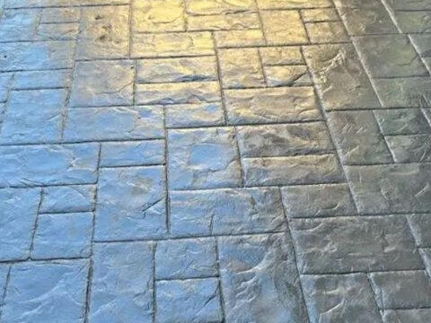 Stamped ashlar-pattern concrete patio